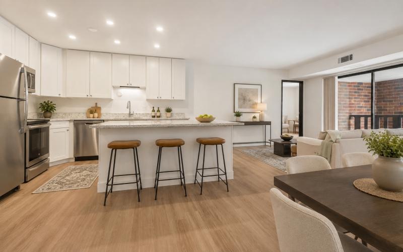 a kitchen with a table and chairs